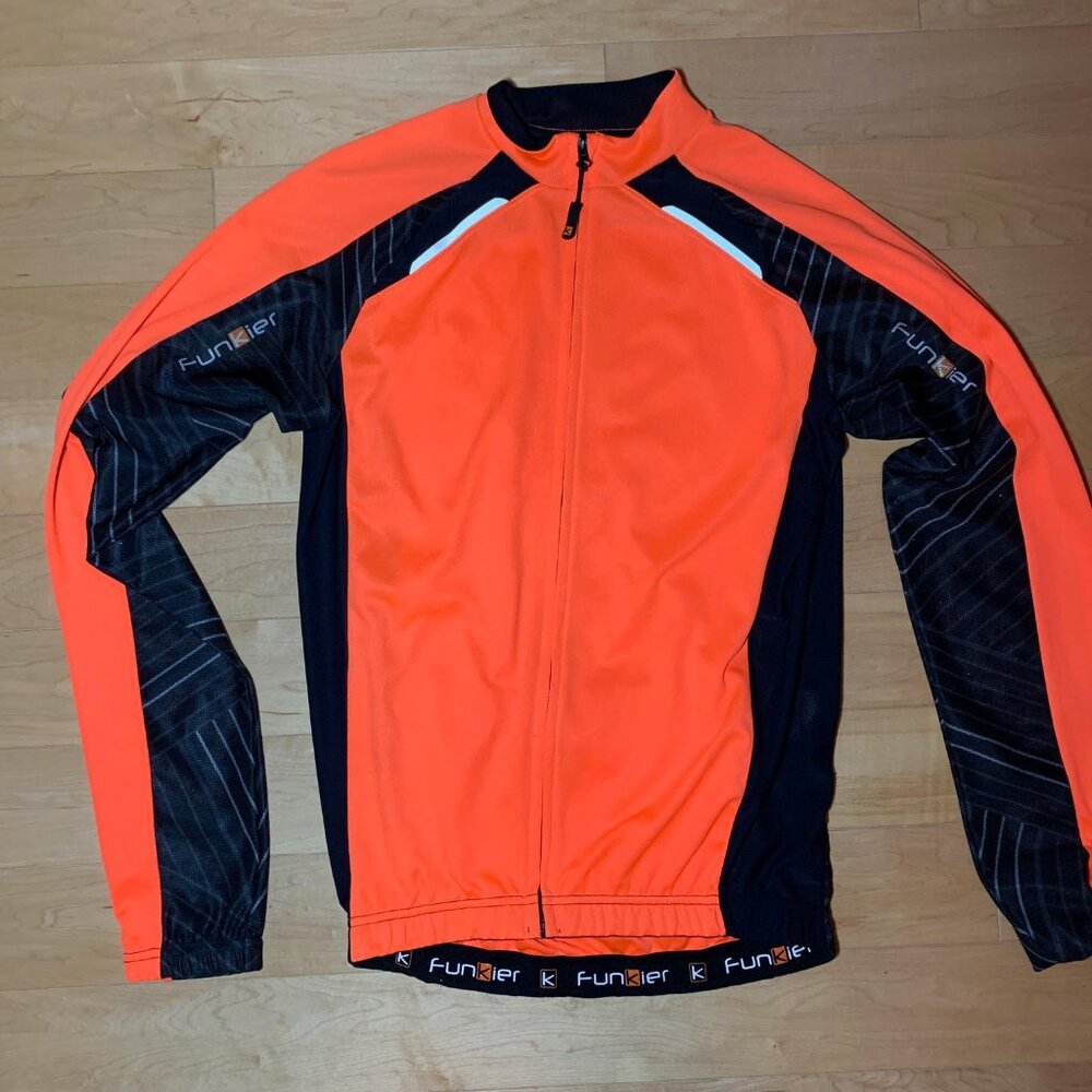 Like new Funkier orange women's cycling jersey